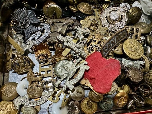 A Collection of Cap Badges and Buttons Just Arrived.